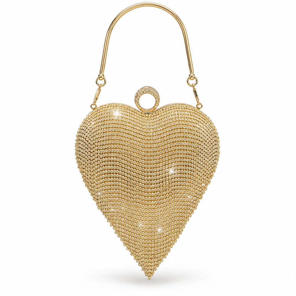 A gold heart-shaped evening clutch bag made of shimmering rhinestone mesh, featuring a curved top handle and a circular ring detail at the top center, shown against a plain white background.