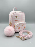 Pink checkered backpack with gold accents and a matching leash on a gray background